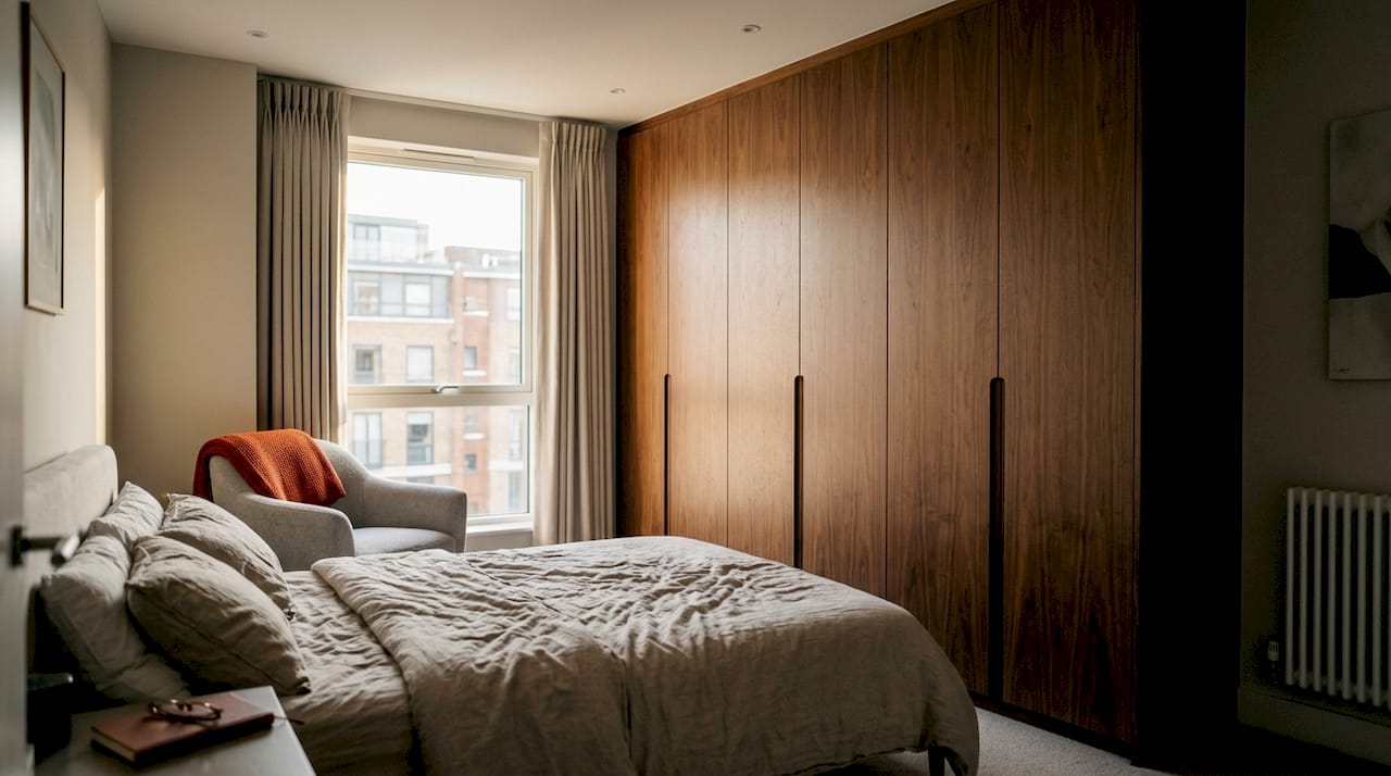 Bespoke fitted wardrobe in West London bedroom