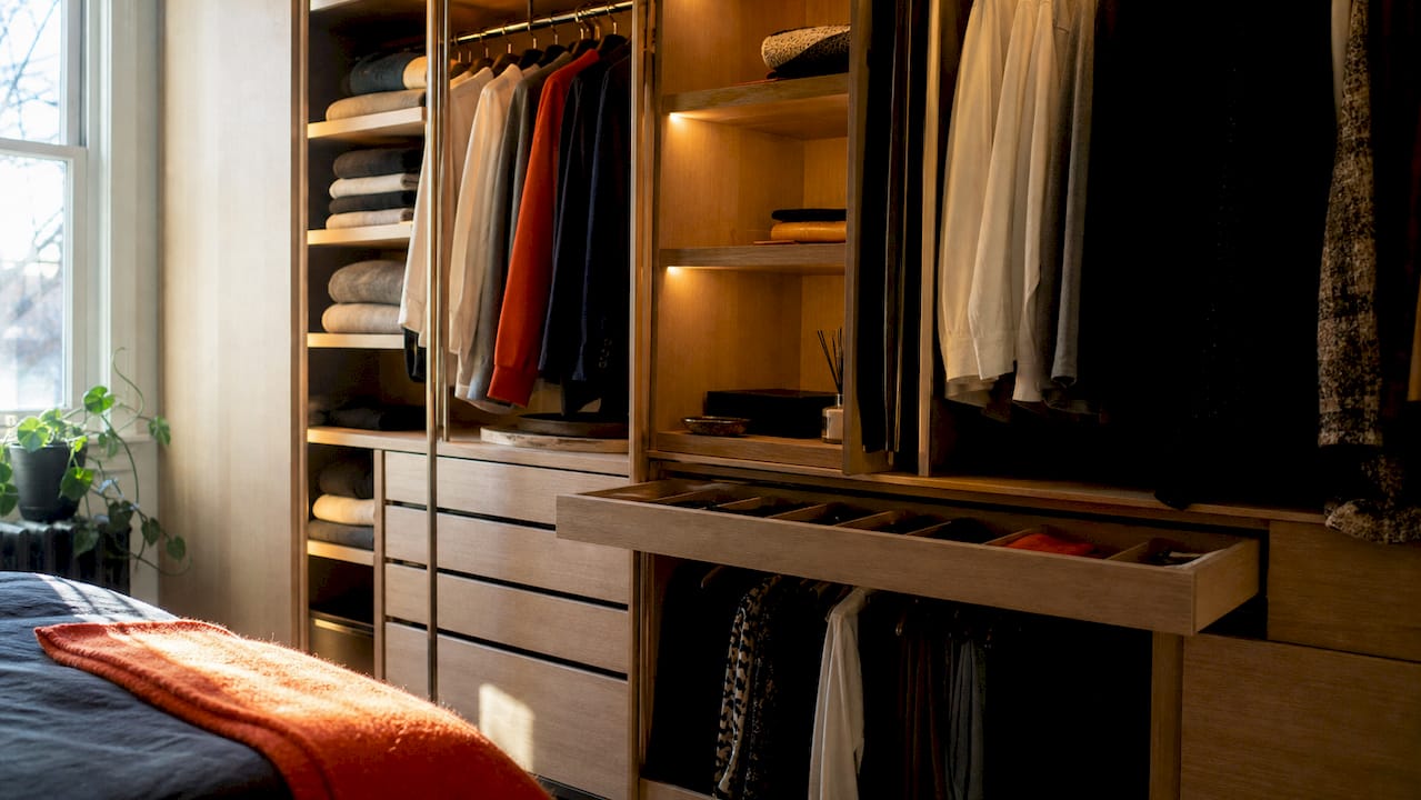 Close-up of bespoke wardrobe interior with LED lighting