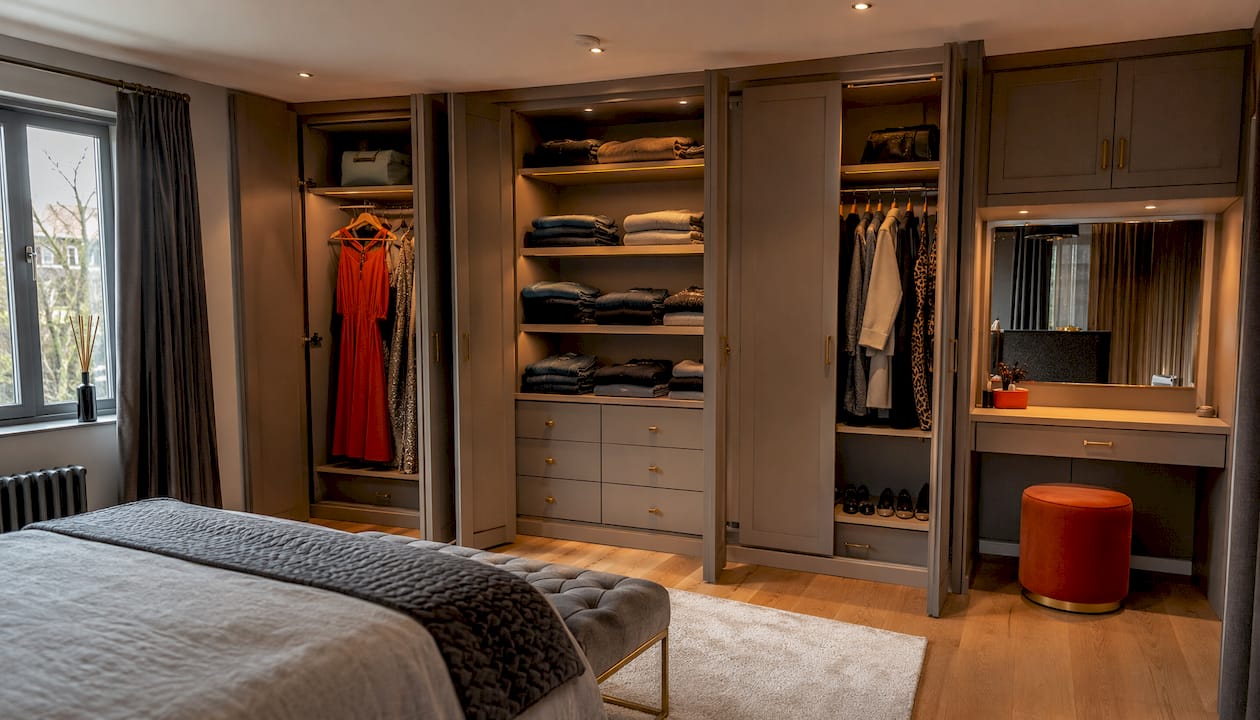 Wardrobe interior with wood veneer and leather insets