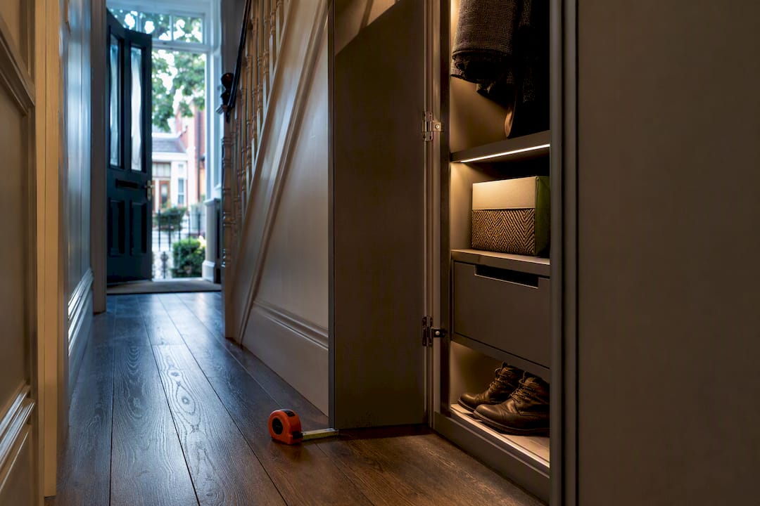 Bespoke hallway cupboard beside clear walkway